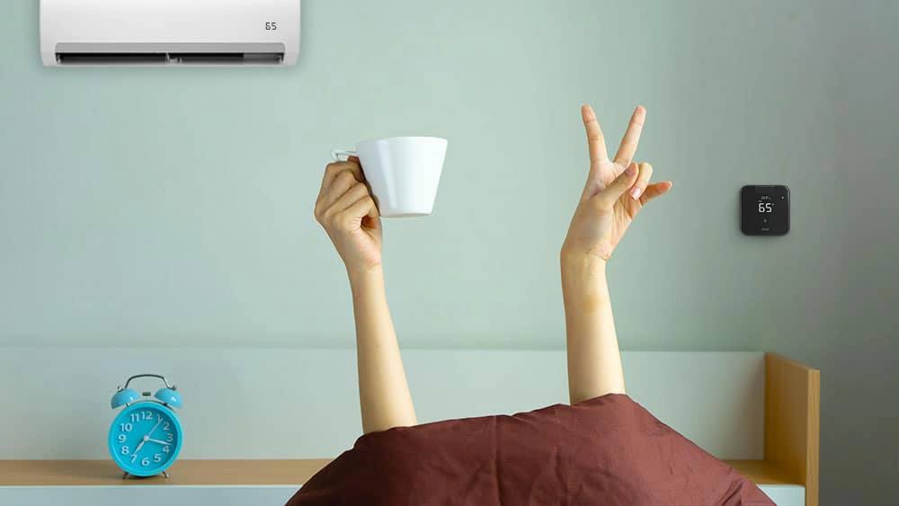A person waking up after a restful sleep as Breez max maintained ideal sleeping temperature 