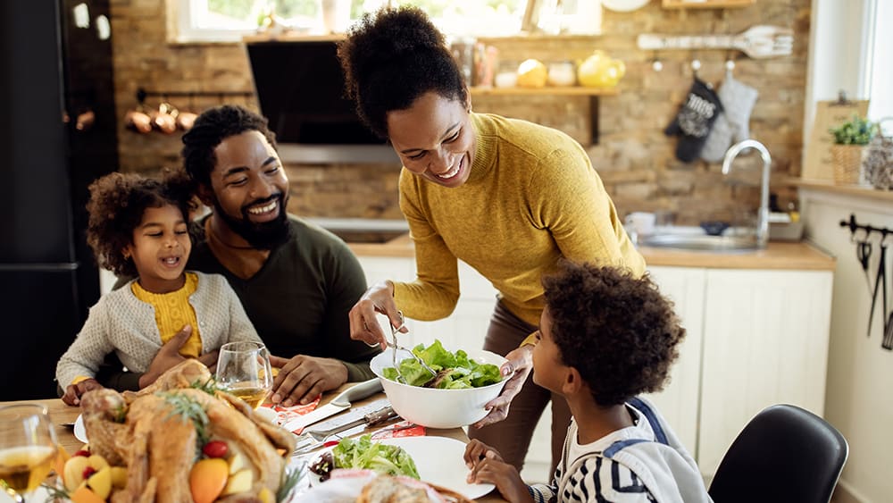 Family having thanksgiving dinner.