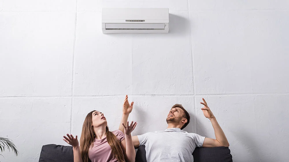 Couple frustrated over AC not turning on.
