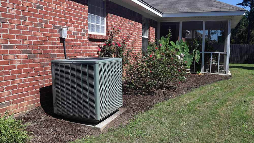AC outer in the lawn. 