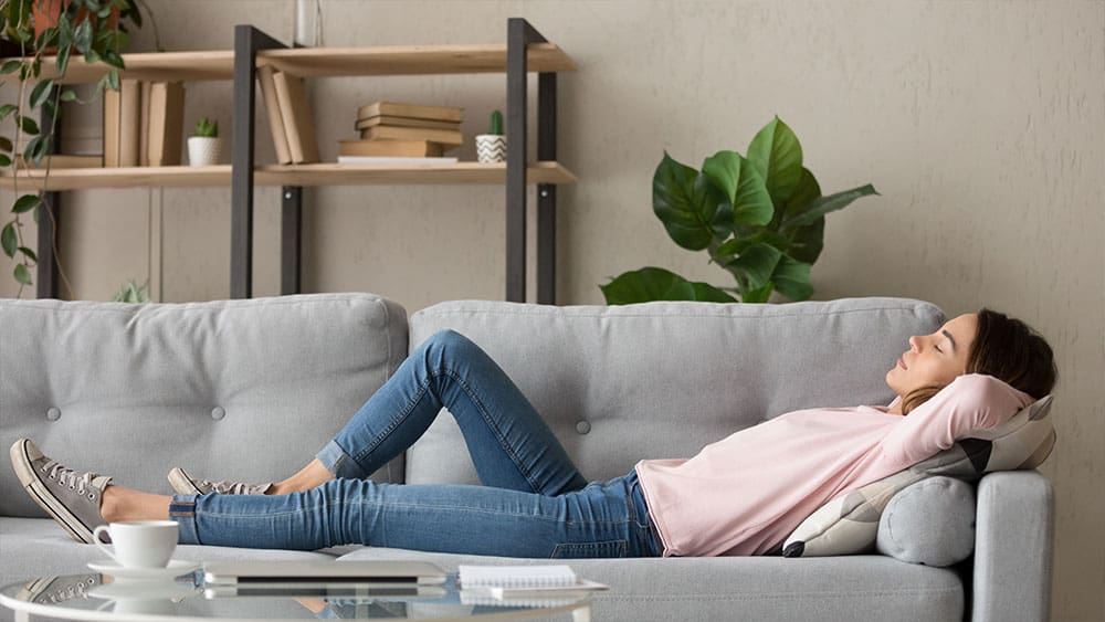 Girl sleeping on the couch.
