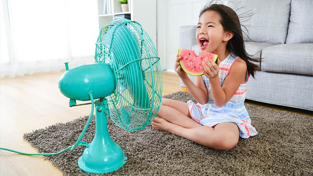 A girls eating watermelon and enjoying summer season