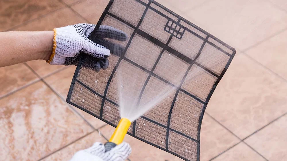 Cleaning a window AC unit 