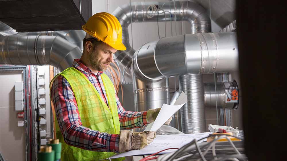 HVAC techician checking the HVAC systems 