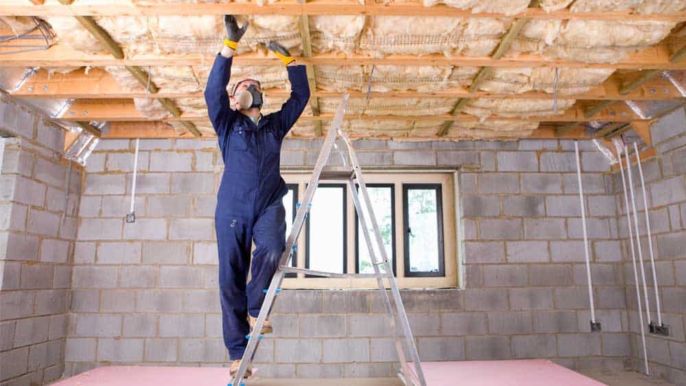 A professional installing ceiling installation