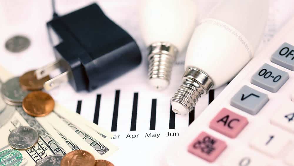 Light bulbs and change on a table.