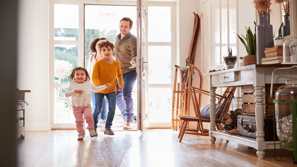 kids and parents entering home