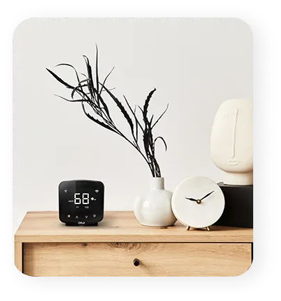 Cielo Breez Plus placed on table with active heat mode