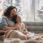 mother and daughter enjoying time together in wintertime