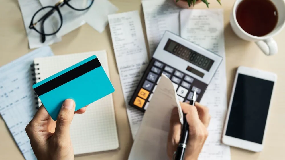 woman calculating electricity bills