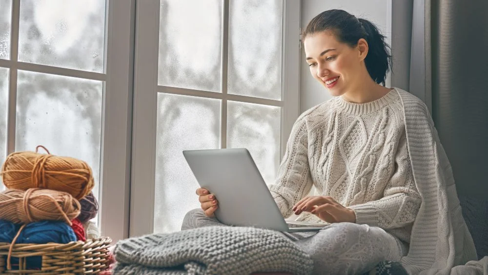 woman sitting at home in winter