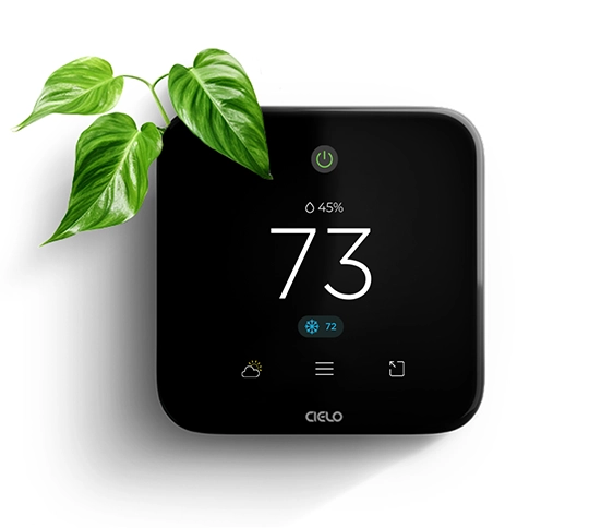 Cielo Breez Edge showing indoor temperature 73 F. A small plant with green leaves is shown in the top left corner.